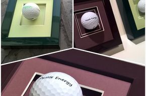 Inramade golfbollar med passepartout